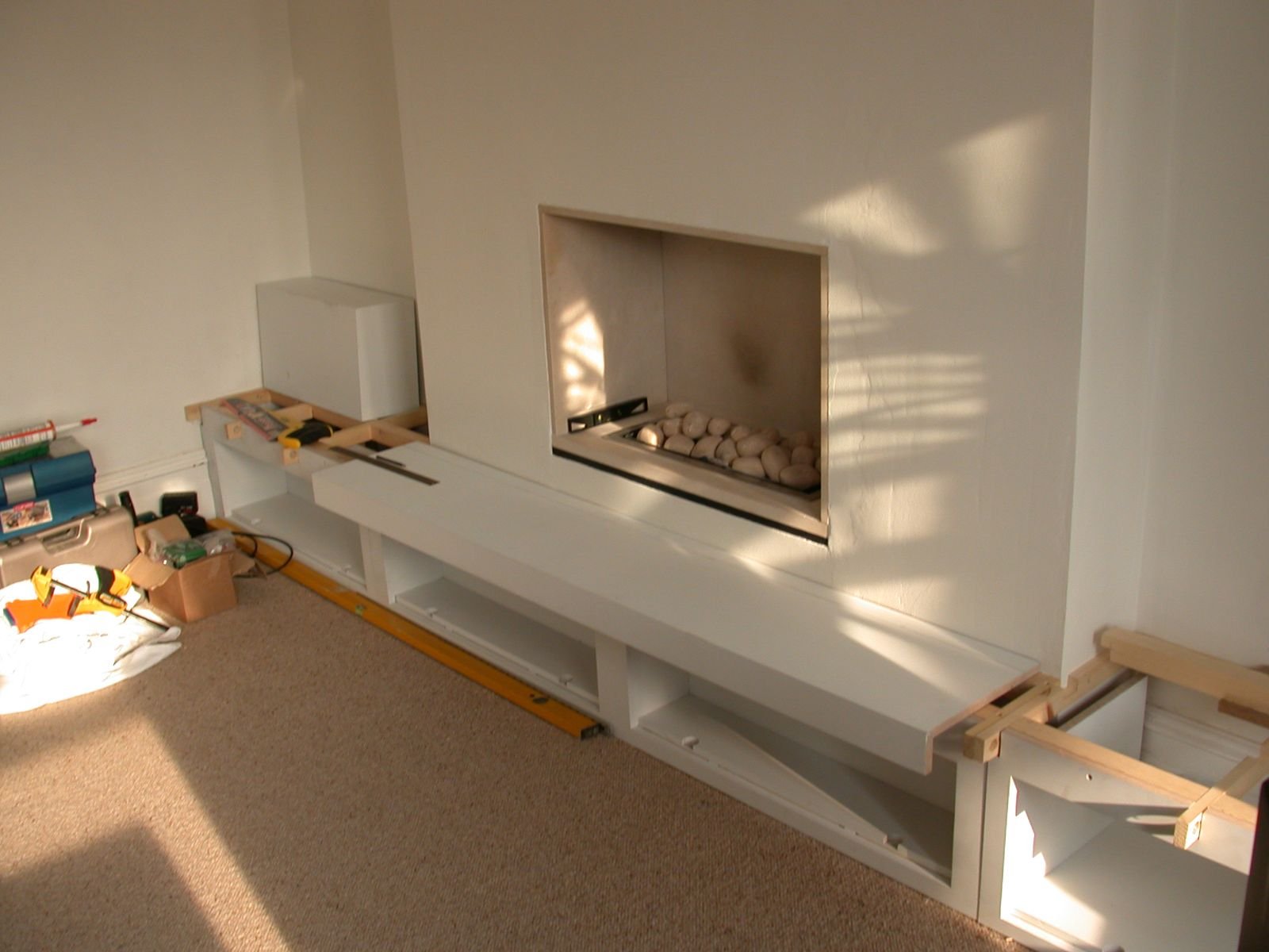 The unit frames going in on site around the fireplace