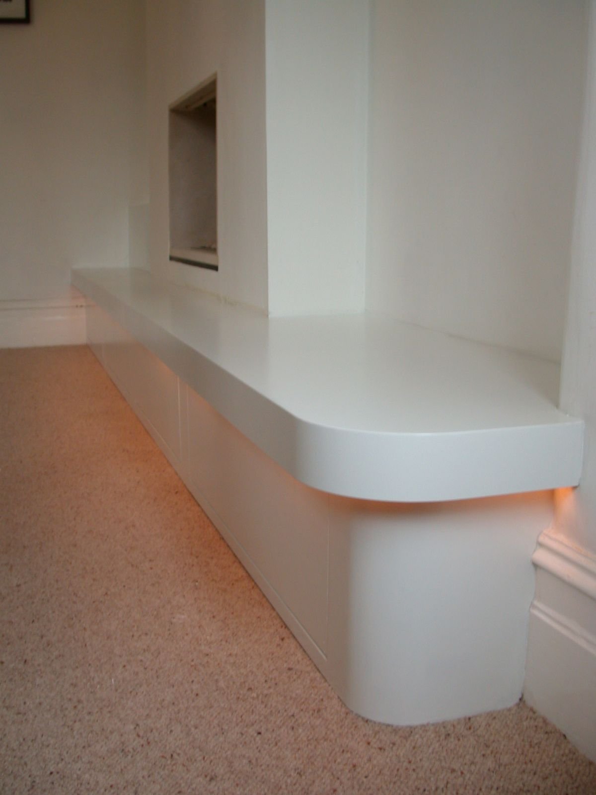 The curved end with the LED rope light glowing underneath
