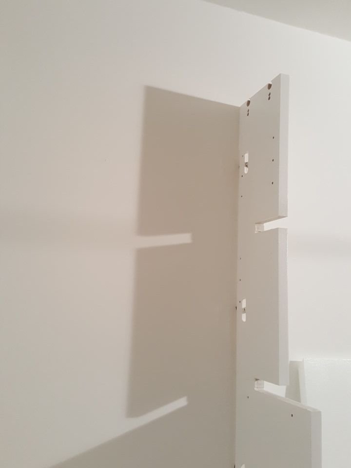 A post with slots and knock-down fittings