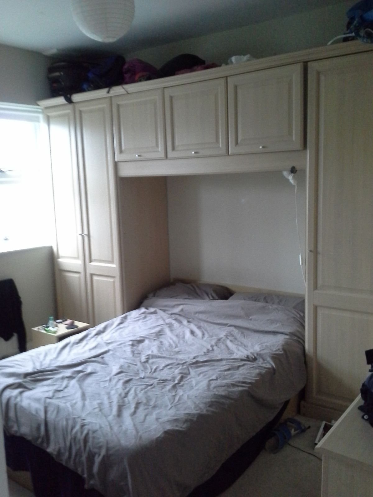 The old built-in wardrobe unit around the bed in Streatham