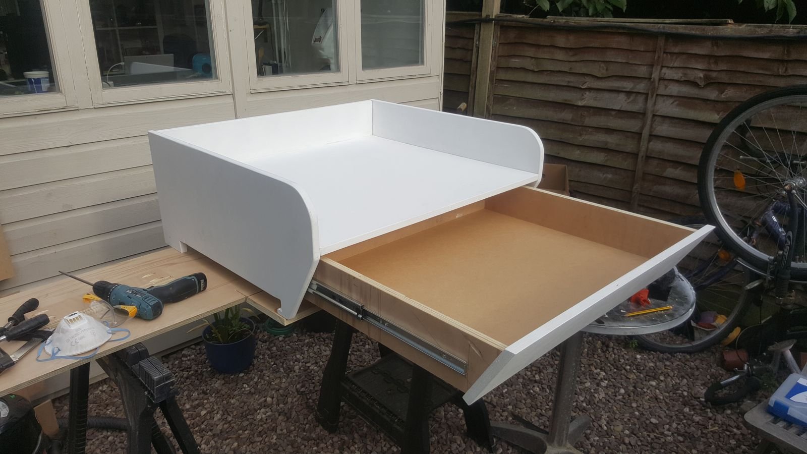 The big drawer pulled out from under the changing surface